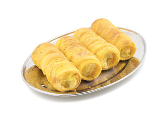 Sweet Dish Puff Roll with Cream Also Know As Homemade Cream Roll, Bakery Food Isolated on White Background