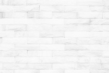 Obraz premium Cream and white brick wall texture background. Brickwork or stonework flooring interior rock old pattern clean concrete grid uneven bricks design stack.