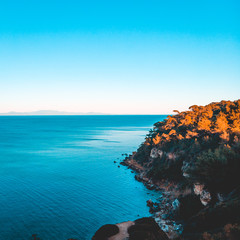 Tranquil rocky mediterranean sea coastline