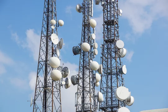 Telecommunication Radio Antenna And Satelite Tower With Blue Sky Stock  Photo, Picture and Royalty Free Image. Image 28591650.