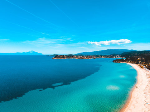 Idyllic sandy beach and calm blue ocean