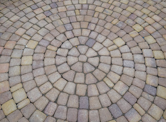 Background texture of paving slabs in circles.