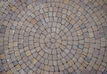 Background texture of paving slabs in circles.