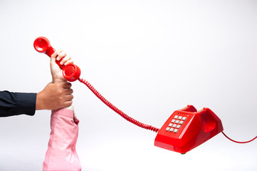 Hand holding telephone 
