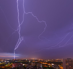 Moscow, Ostankino district, Russia. Lightning beating in the Ostankino TV tower. Rain, storm and light in the night city. Dramatic sky
