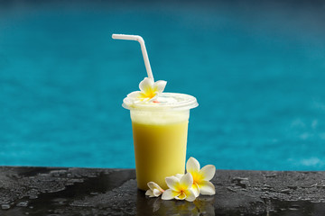 Fruit shake next to pool