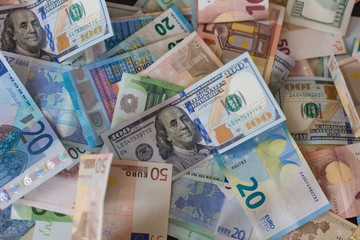 dollar and euro banknotes