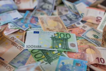 dollar and euro banknotes