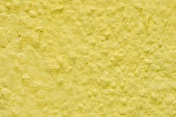 Abstract background, yellow plastered wall