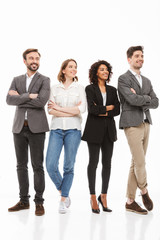 Obraz premium Full length portrait of a group of multiracial business people