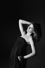 Obraz premium female portrait in a dark hall,