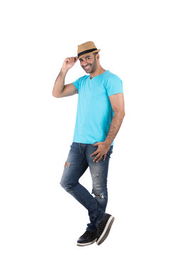 holding the hat's tip