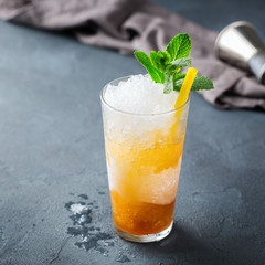Classic mint julep cocktail with bourbon and ice
