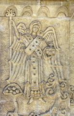 A fragment of the relief at the northern entrance to the Intercession Cathedral of the Marfo-Mariinsky Convent in Moscow. May 2017