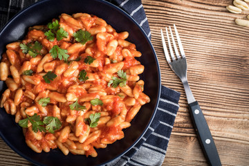 Cavatelli pasta with fresh tomato sauce.