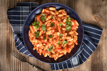 Cavatelli pasta with fresh tomato sauce.