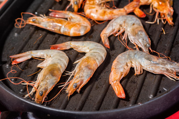 Grilled Shrimp on Black Electric Pan.