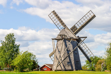 Fototapeta na wymiar Windmill in rural landscape