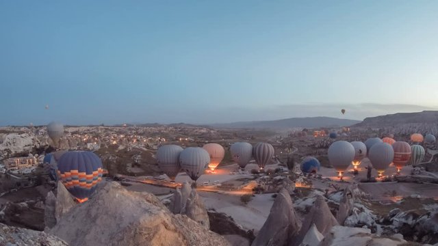 Time lapse of start of balloons in sunrise, Cappadocia