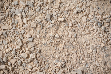 Gravel and pebbles background pattern, small and big sand