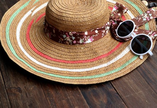 straw hat and sunglasses