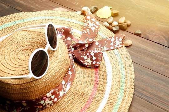 straw hat and sunglasses