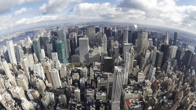 Impressive fish eye time lapse panorama view on modern architecture towers skyscrapers of New York Manhattan downtown