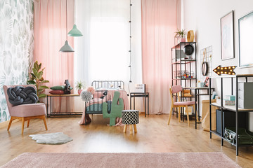 Modern ottoman in stylish bedroom