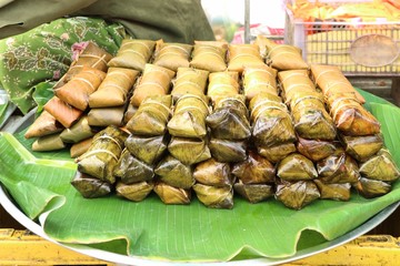 Sticky rice wrapped in banana leaves
