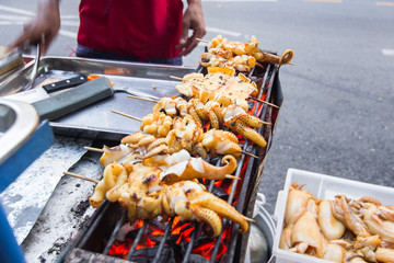 Grilled squid at the market.