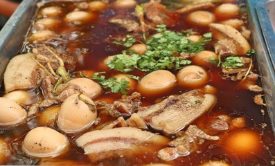 Eggs and pork in brown sauce