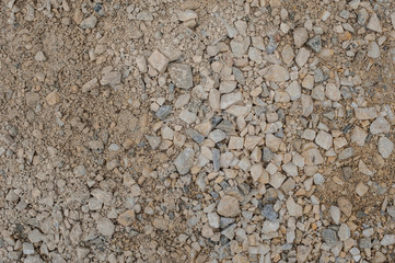 Gravel and pebbles background pattern, small and big sand