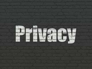 Obraz premium Safety concept: Painted white text Privacy on Black Brick wall background