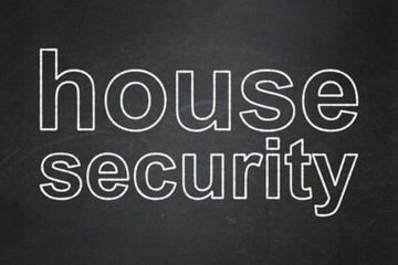Safety concept: text House Security on Black chalkboard background