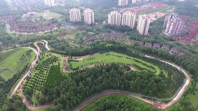 aerial footage of a beautiful park called Taman Saujana Hijau located in Presint 11, Putrajaya, Malaysia. 1080p full HD aerial drone footage mp4 codec high quality.  