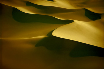 Low Aerial view of Dumont Dunes, a study of light and shadow, Mojave Desert, California 