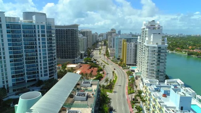Aerial hyperlapse footage Miami Beach condominiums Collins Avenue