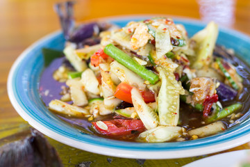 Sofe focus of Spicy Cucumber Salad on table. Thailand food, Som Tum Taeng or cucumber salad Thai style.