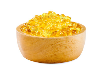 Fish oil, soft capsule, omega, supplement in wood bowl  isolated  on white background with clipping path ,healthy product concept close up