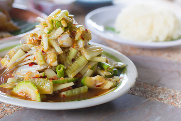Sofe focus of Spicy Cucumber Salad on table. Thailand food, Som Tum Taeng or cucumber salad Thai style.
