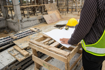 professional engineer worker at the house building construction site