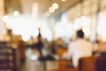 Restaurant cafe or coffee shop interior with people abstract defocused blur background