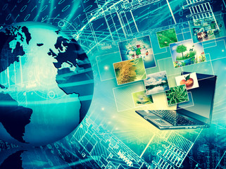 Computer mobility, internet communication and cloud computing concept: laptop with cloud of color application icons