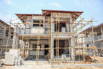Fototapeta premium house under construction with autoclaved aerated concrete block structure at building site