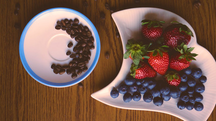  A cup of coffee and coffee beans, blueberries and strawberries