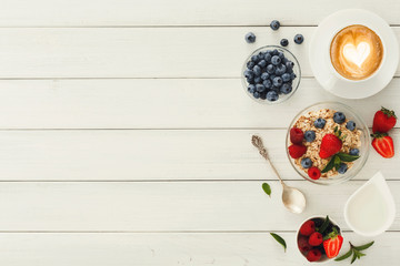 Naklejka na ściany i meble Healthy and tasty breakfast on white wood, top view