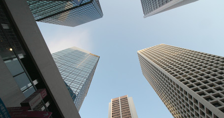Fototapeta na wymiar Blue skyscraper from below