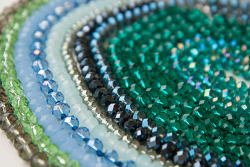 Colorful Shinny Crystal Beads Glass Isoalted on White Background Copy space Hobby Handmade Fashion Beauty