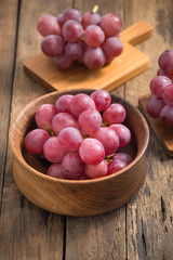Grapes on a wooden table

