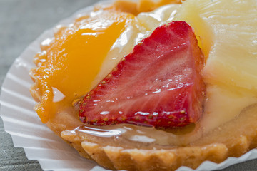 Curd tartlet with fruit.